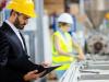 persone al lavoro con caschi sicurezza bando isi 
